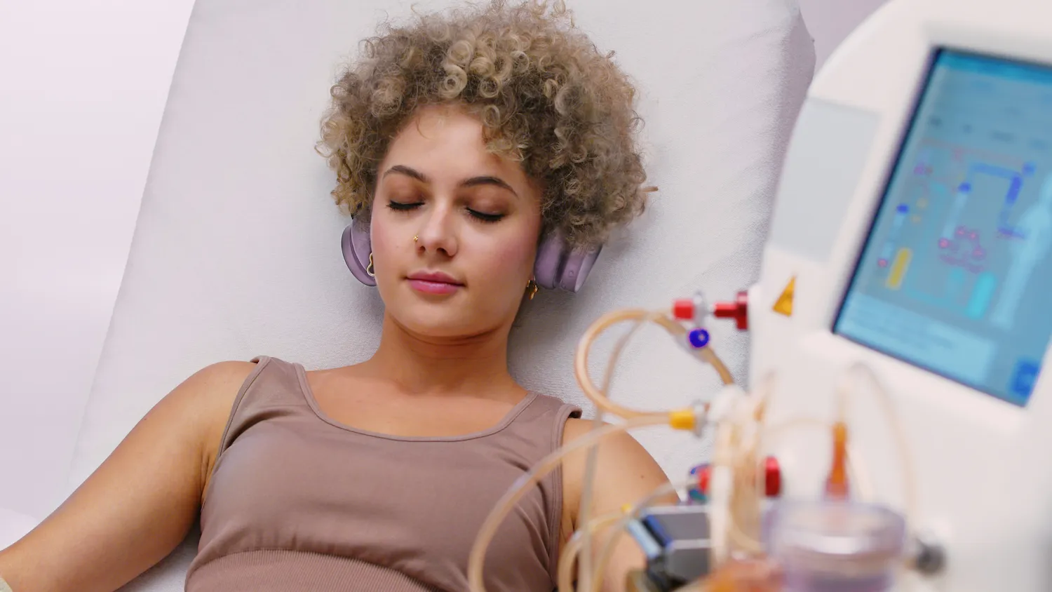 Woman receiving inuspheresis treatment